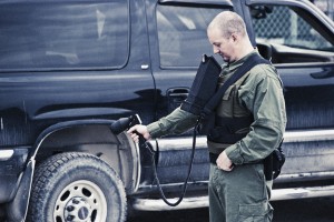 EOMAX Security Professional Checking Vehicles with Infrared Imaging